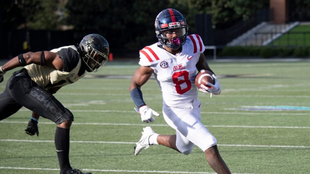 Mississippi wide receiver Elijah Moore (8) drives into the end zone for a touchdown past Vanderbilt during the second quarter at Vanderbilt Stadium Saturday, Oct. 31, 2020 in Nashville, Tenn.